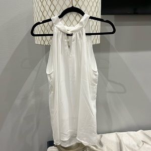 White sleeveless blouse